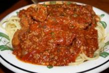 Spaghetti With Spicy Three Meat Sauce and Chicken Fritta
